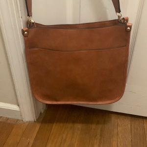 Brand new messenger bag with interchangeable strap included